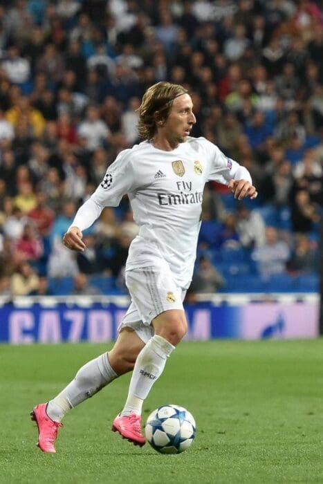 Luka Modric playing for Real Madrid in a Champions League match against Shakhtar Donetsk